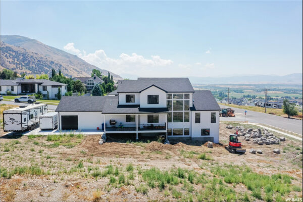 Aerial view of backyard and house of custom built home by kj custom builders in boise idaho