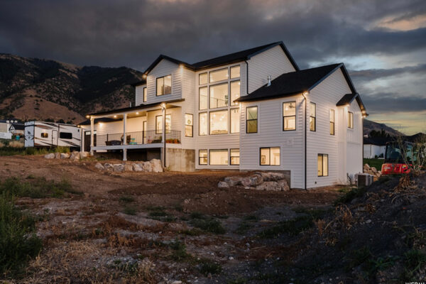 Evening photo of back of custom built home in boise idaho