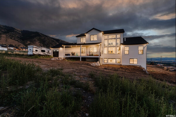 Full view of custom built home from backyard in boise idaho