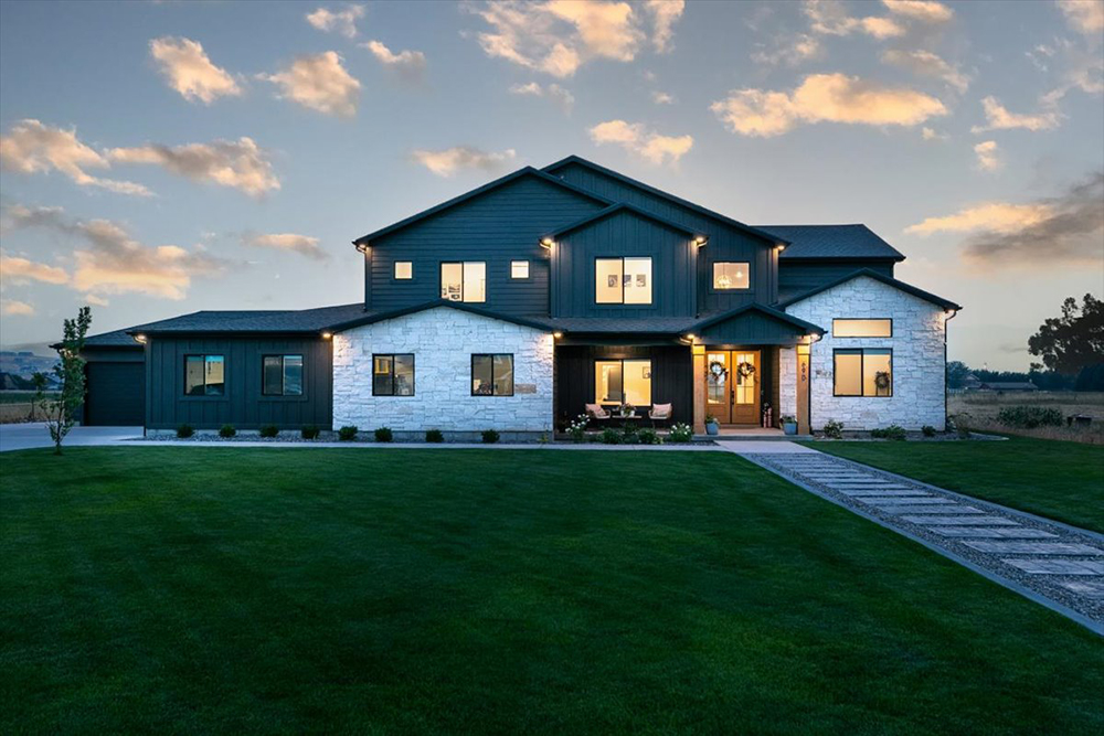 Front of custom built home in the evening with beautiful sky background, built by KJ Custom builders in Boise Idaho