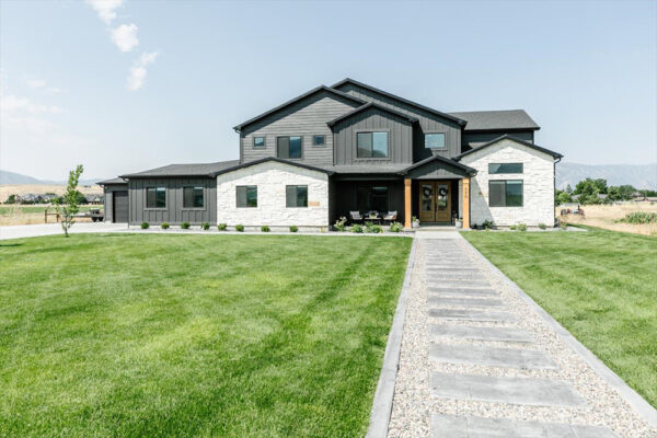 Front of custom built home and custom made path to front door by KJ Custom Builders in Boise Idaho