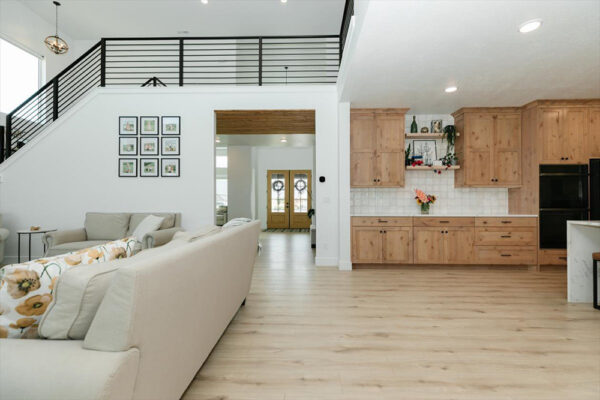 Spacious living room next to kitchen in custom built home in Boise Idaho