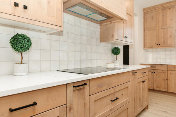 Custom built kitchen with wood cabinets by KJ Builders in Boise Idaho