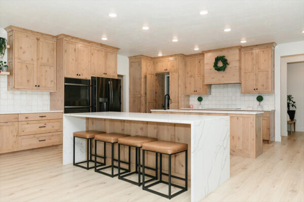 Custom built kitchen with wood cabinets and two islands based in Boise Idaho