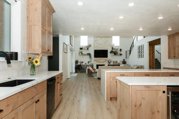 Custom built kitchen with wood cabinets and two islands in Boise Idaho