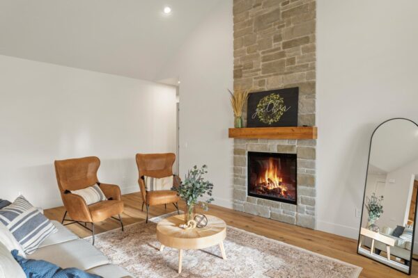 custom built living room with fireplace side view